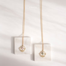 Load image into Gallery viewer, Daphne Leaf Ring of Life Pendant With Iridescent Green Pearl Long Necklace