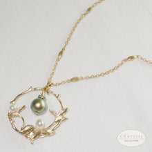 Load image into Gallery viewer, Daphne Leaf Ring of Life Pendant With Iridescent Green Pearl Long Necklace
